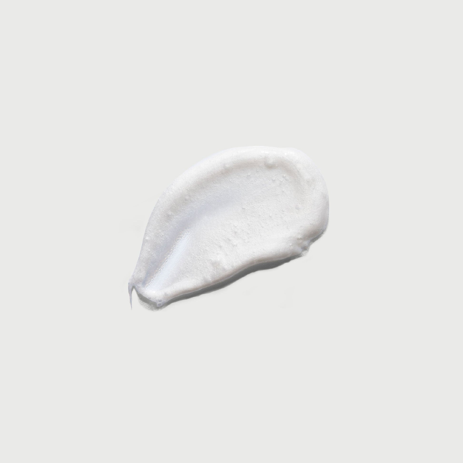 the-smoother-glycolic-acid-exfoliating-body-wash-d2 NATR-40002-Swatch-The-Smoother-Glycolic-Acid-Exfoliating-Body-Wash-bonebkgd.jpg